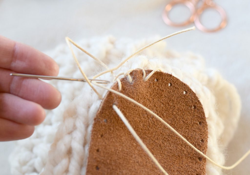 using the blanket stitch to attach soles to crochet shoes