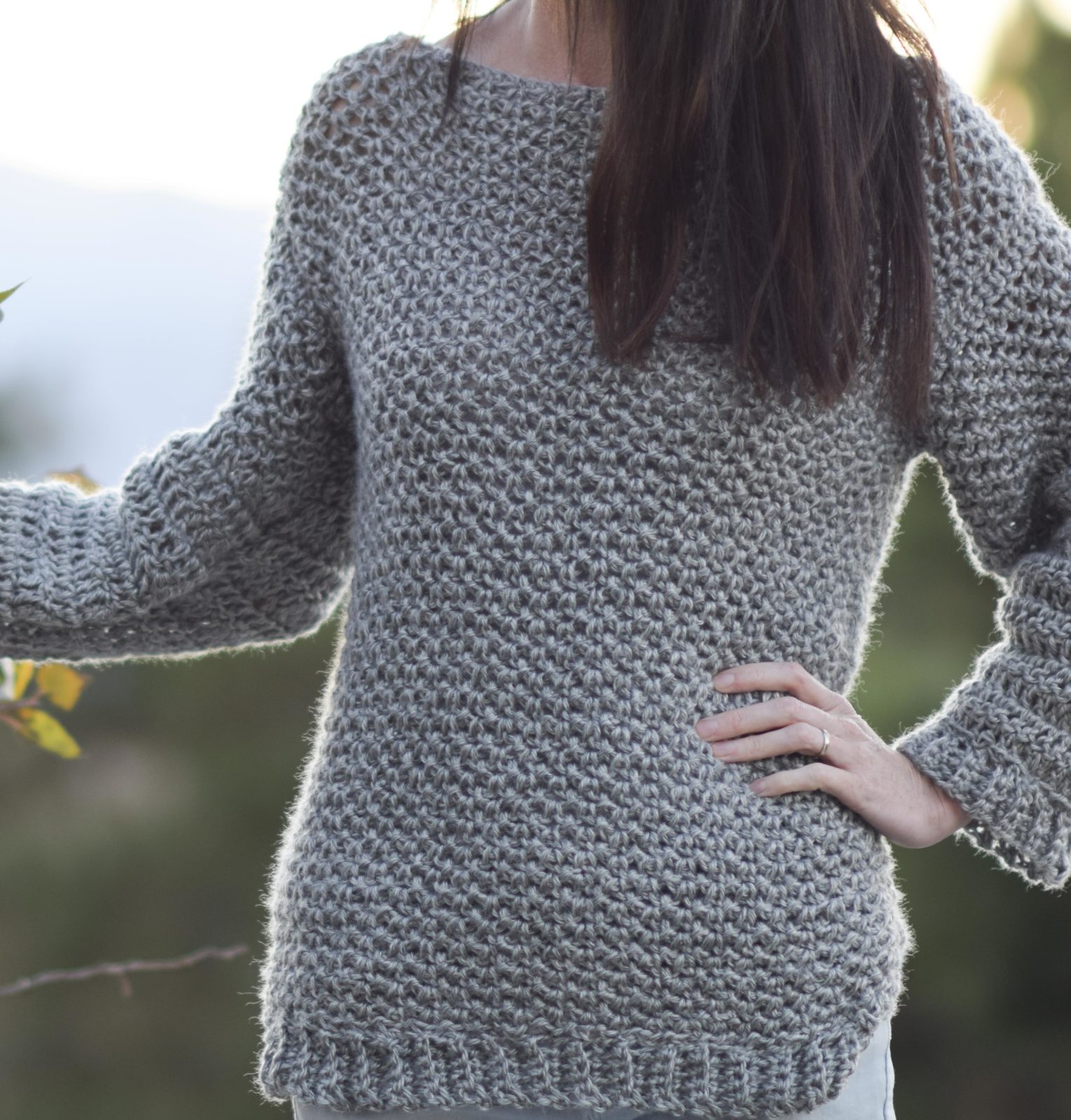 A Skein of Beautiful Gray Knitting Threads, with Two Long Knitting